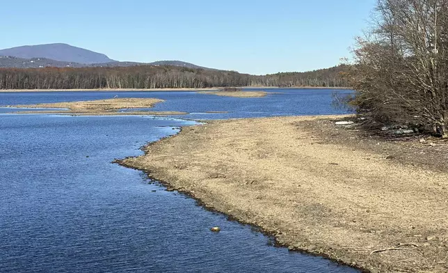 Receding waters expose the lake bed at the Ashokan Reservoir in Ulster County, New York, on Wednesday, Nov. 13, 2024. (AP Photo/Ted Shaffrey)