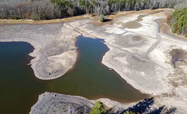 Receding waters expose the lake bed at the Ashokan Reservoir in Ulster County, New York, on Wednesday, Nov. 13, 2024. (AP Photo/Ted Shaffrey)