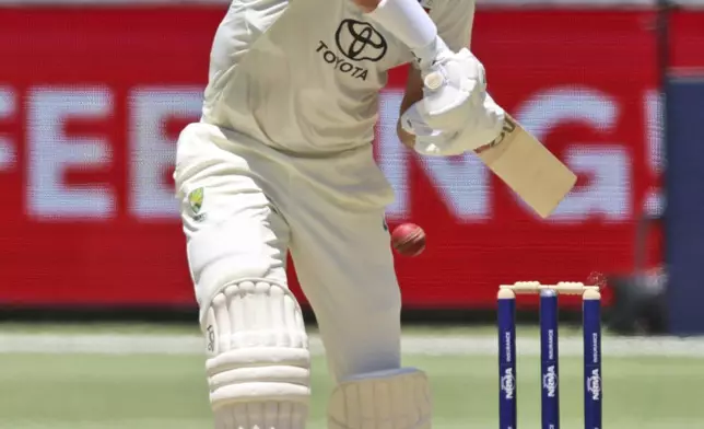 Australia's Mitchell Starc bats on the second day of the first cricket test between Australia and India in Perth, Australia, Saturday, Nov. 23, 2024. (AP Photo/Trevor Collens)