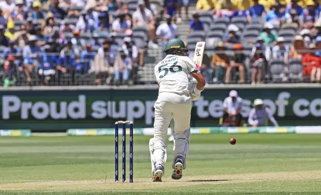 Australia's Mitchell Starc bats on the second day of the first cricket test between Australia and India in Perth, Australia, Saturday, Nov. 23, 2024. (AP Photo/Trevor Collens)