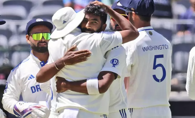 India's captain Jasprit Bumrah, facing the camera, celebrates the wicket of Australia's Alex Carey on the second day of the first cricket test between Australia and India in Perth, Australia, Saturday, Nov. 23, 2024. (AP Photo/Trevor Collens)