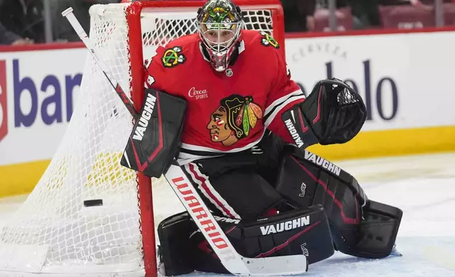 Chicago Blackhawks goaltender Petr Mrazek makes a save during the second period of an NHL hockey game against the Florida Panthers, Thursday, Nov. 21, 2024, in Chicago. (AP Photo/Erin Hooley)