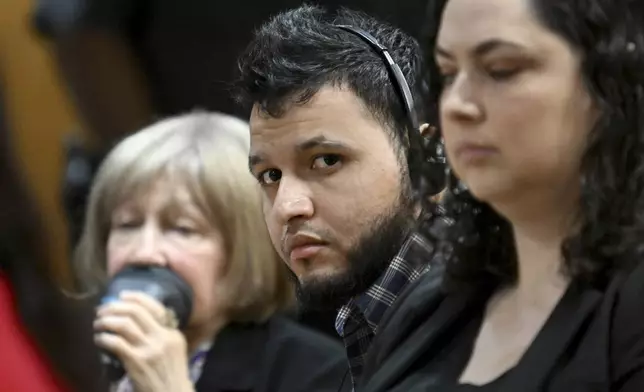 Jose Ibarra listens through an interpreter during a hearing of the killing of a Georgia nursing student at Athens-Clarke County Superior Court, Tuesday, Nov. 12, 2024, in Athens, Ga. (Hyosub Shin/Atlanta Journal-Constitution via AP)