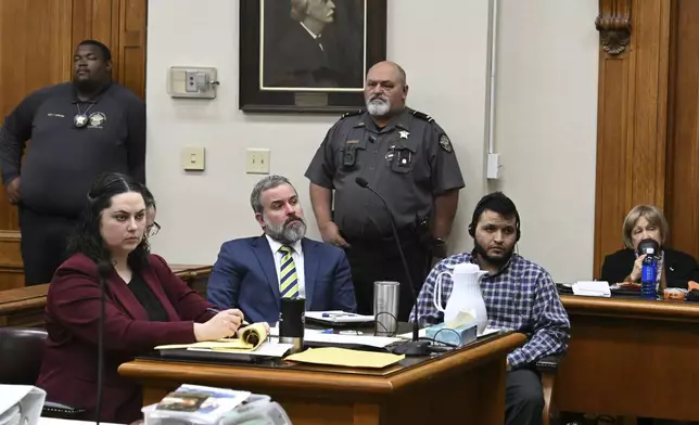 Jose Ibarra, right, accused of killing a Georgia nursing student earlier this year, listens through an interpreter as he sits with his attorneys during his trial at Athens-Clarke County Superior Court, Friday, Nov. 15, 2024, in Athens, Ga. (Hyosub Shin/Atlanta Journal-Constitution via AP, Pool)