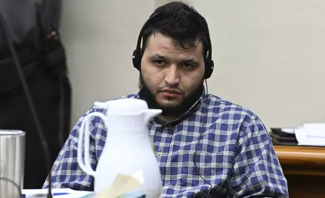 Jose Ibarra, accused of killing a Georgia nursing student earlier this year, listens through an interpreter during his trial at Athens-Clarke County Superior Court, Friday, Nov. 15, 2024, in Athens, Ga. (Hyosub Shin/Atlanta Journal-Constitution via AP, Pool)
