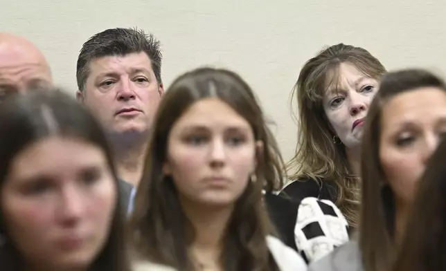 Jason Riley, background left, father of Laken Riley, attends the trial of Jose Ibarra, accused of killing the Georgia nursing student earlier this year at Athens-Clarke County Superior Court, Friday, Nov. 15, 2024, in Athens, Ga. (Hyosub Shin/Atlanta Journal-Constitution via AP, Pool)
