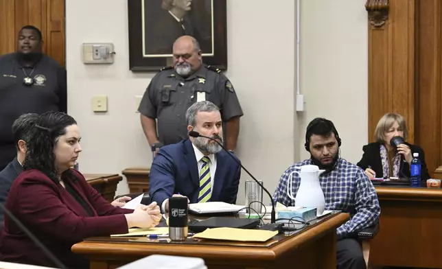 Jose Ibarra, right, accused of killing a Georgia nursing student earlier this year, listens through an interpreter as he sits with his attorneys Dustin Kirby, second left, and Kaitlyn Beck, left, during his trial at Athens-Clarke County Superior Court, Friday, Nov. 15, 2024, in Athens, Ga. (Hyosub Shin/Atlanta Journal-Constitution via AP, Pool)