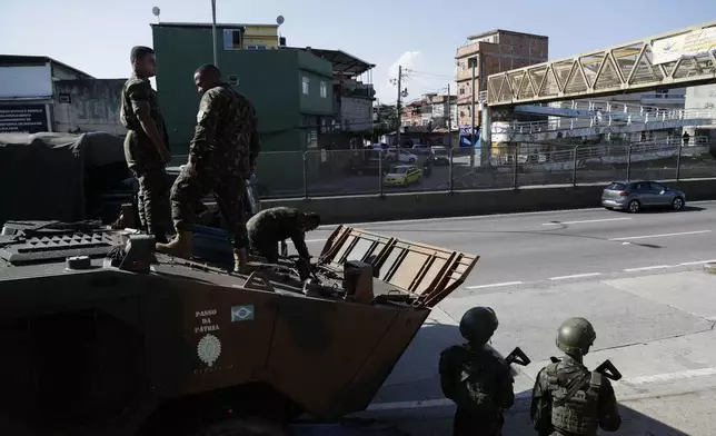 Brazilian soldiers guard the streets during the G20 Summit in Rio de Janeiro, Monday, Nov. 18, 2024. (AP Photo/Bruna Prado)