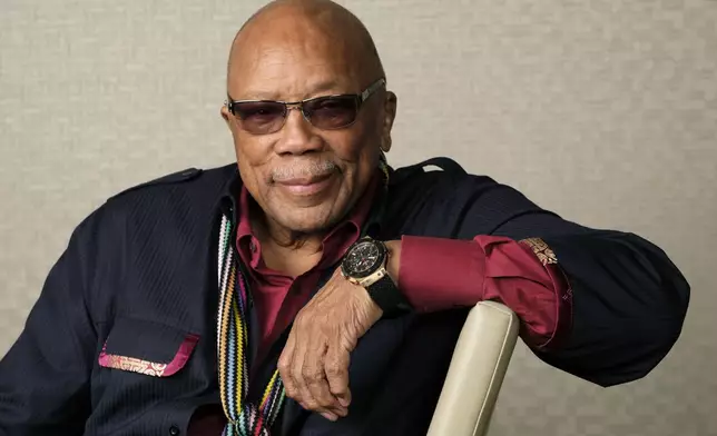 FILE - Music producer Quincy Jones poses for a portrait to promote his documentary "Quincy" during the Toronto Film Festival on Sept. 7, 2018, in Toronto. (Photo by Chris Pizzello/Invision/AP, File)