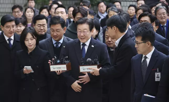 South Korea's main opposition Democratic Party leader Lee Jae-myung arrives at a court in Seoul, South Korea, Monday, Nov. 25, 2024. (Kim Hong-ji/Pool Photo via AP)