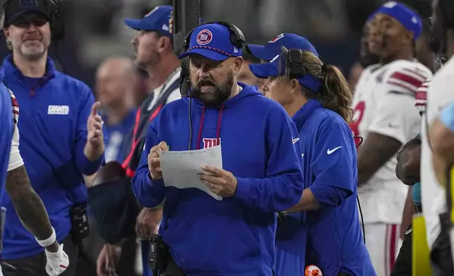 New York Giants head coach Brian Daboll on the sidelines during the second half of an NFL football game against the Dallas Cowboys in Arlington, Texas, Thursday, Nov. 28, 2024. (AP Photo/Tony Gutierrez)