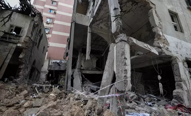 A destroyed building hit on Monday evening by an Israeli airstrike is seen in central Beirut, Lebanon, Tuesday, Nov. 19, 2024. (AP Photo/Bilal Hussein)