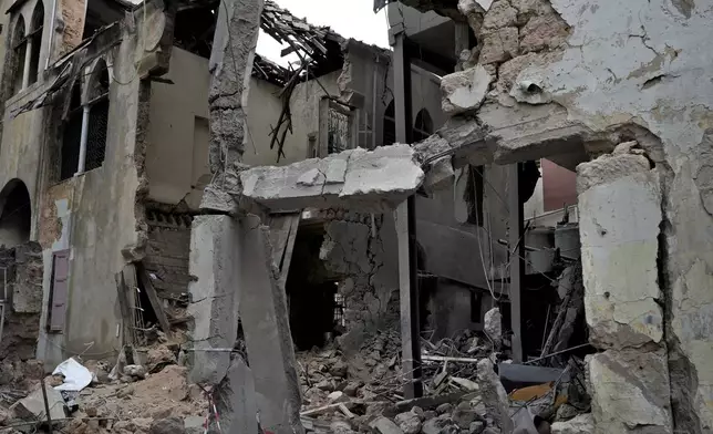 A destroyed building hit on Monday evening by an Israeli airstrike is seen in central Beirut, Lebanon, Tuesday, Nov. 19, 2024. (AP Photo/Bilal Hussein)