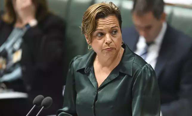 Australian Communications Minister Michelle Rowland speaks during House of Representatives Question Time at Parliament House in Canberra, Monday, Nov.18, 2024. (Lukas Coch/AAP Image via AP)