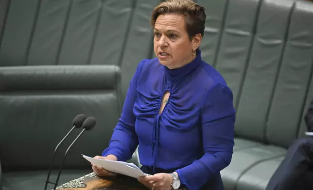 Australia's Minister for Communications, Michelle Rowland, introduces the Online Safety Amendment Bill in the House of Representatives at Parliament House in Canberra, Thursday, Nov. 21, 2024. (Mick Tsikas/AAP Image via AP)/AAP Image via AP)