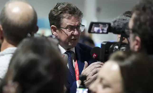 Albert Rosti, of Switzerland, speaks to members of the media at the COP29 U.N. Climate Summit, Friday, Nov. 22, 2024, in Baku, Azerbaijan. (AP Photo/Sergei Grits)