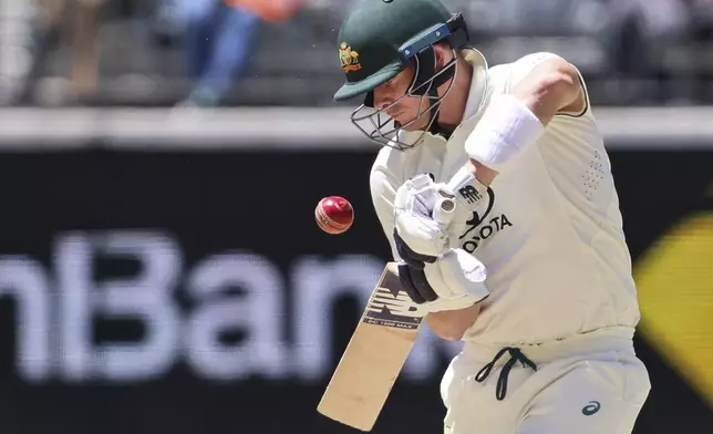 Australia's Steve Smith bats on the fourth day of the first cricket test between Australia and India in Perth, Australia, Monday, Nov. 25, 2024. (AP Photo/Trevor Collens)