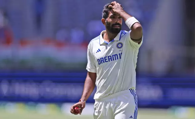 India's captain Jasprit Bumrah gestures as he prepares to bowl on the fourth day of the first cricket test between Australia and India in Perth, Australia, Monday, Nov. 25, 2024. (AP Photo/Trevor Collens)