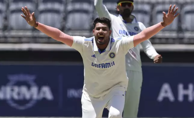 India's Harshit Rana appeals unsuccessfully for the wicket of Australia's Steve Smith on the fourth day of the first cricket test between Australia and India in Perth, Australia, Monday, Nov. 25, 2024. (AP Photo/Trevor Collens)