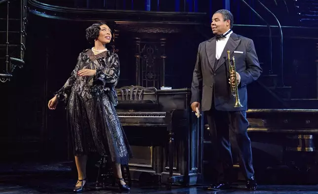 Jennie Harney-Fleming portrays Lil Hardin, left, and James Monroe Iglehart portrays Louis Armstrong during a performance in "A Wonderful World: The Louis Armstrong Musical" in New York. (Jeremy Daniel via AP)