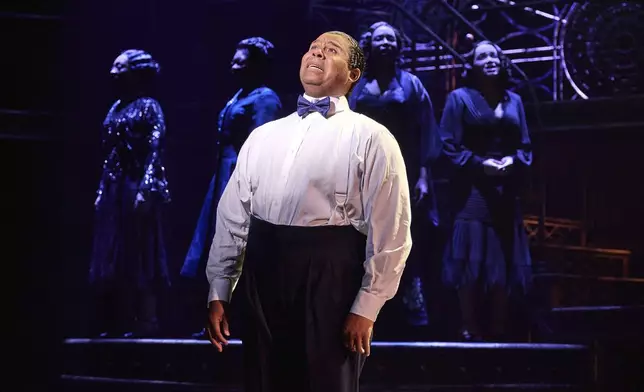 James Monroe Iglehart portrays Louis Armstrong during a performance in "A Wonderful World: The Louis Armstrong Musical" in New York. (Jeremy Daniel via AP)