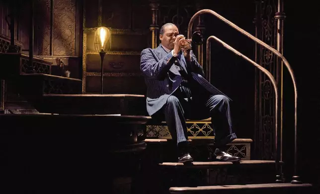 James Monroe Iglehart portrays Louis Armstrong during a performance in "A Wonderful World: The Louis Armstrong Musical" in New York. (Jeremy Daniel via AP)