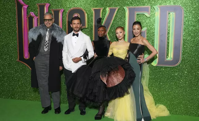 Jeff Goldblum, from left, Jonathan Bailey, Cynthia Erivo, Ariana Grande and Michelle Yeoh pose for photographers upon arrival at the premiere of the film 'Wicked' on Monday, Nov. 18, 2024, in London. (Photo by Scott A Garfitt/Invision/AP)