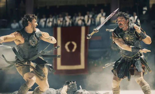 This image released by Paramount Pictures shows Paul Mescal, left, and Pedro Pascal in a scene from "Gladiator II." (Aidan Monaghan/Paramount Pictures via AP)