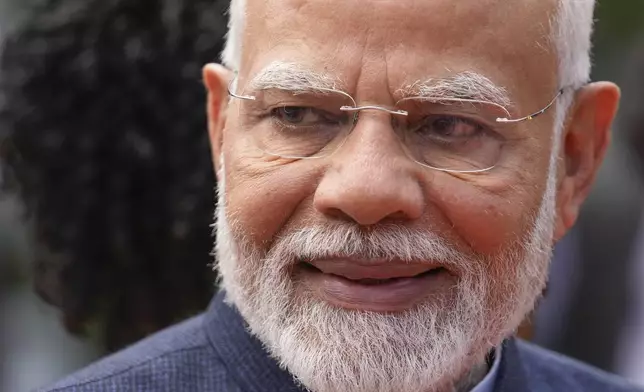 India's Prime Minister Narendra Modi smiles at the end of a meeting with his Guyanese counterpart, at the Government House in Georgetown, Guyana, Wednesday, Nov. 20, 2024. (AP Photo/Matias Delacroix)