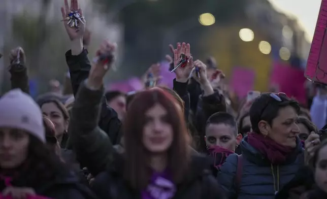 Demonstrators take part in a rally ahead of the International Day for the Elimination of Violence against Women which will be held on Nov. 25, in Rome, Saturday, Nov. 23, 2024. (AP Photo/Andrew Medichini)