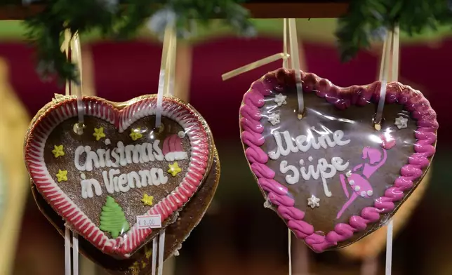 Gingerbread hearts displayed at the Wiener Chritkindlmarkt in front of Vienna's city hall, one of Vienna's most popular Christmas markets, in Vienna, Austria, Saturday, Nov. 16, 2024. (AP Photo/Christian Bruna)