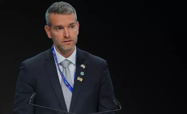 Attila Steiner, Hungarian presidency of the council of the EU, speaks during a plenary session at the COP29 U.N. Climate Summit, Tuesday, Nov. 19, 2024, in Baku, Azerbaijan. (AP Photo/Peter Dejong)