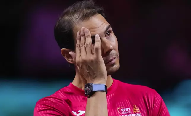 Spain's Rafael Nadal during a tribute after playing his last match as a professional tennis player in the Davis Cup quarterfinals at the Martin Carpena Sports Hall in Malaga, southern Spain, on early Wednesday, Nov. 20, 2024. (AP Photo/Manu Fernandez)