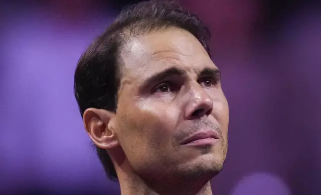 Spain's Rafael Nadal during a tribute after playing his last match as a professional tennis player in the Davis Cup quarterfinals at the Martin Carpena Sports Hall in Malaga, southern Spain, on early Wednesday, Nov. 20, 2024. (AP Photo/Manu Fernandez)