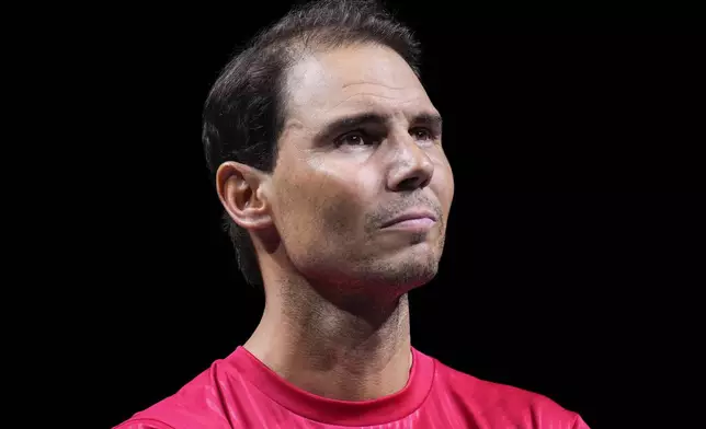 Spain's Rafael Nadal during a tribute after playing his last match as a professional tennis player in the Davis Cup quarterfinals at the Martin Carpena Sports Hall in Malaga, southern Spain, on early Wednesday, Nov. 20, 2024. (AP Photo/Manu Fernandez)