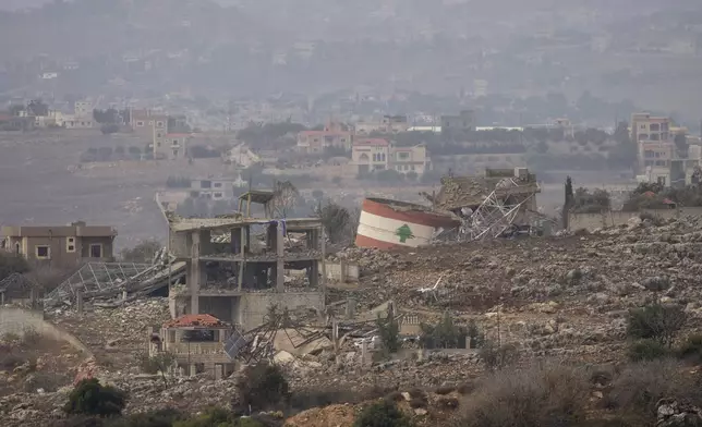 Lebanese village of Meiss El-Jabal can be seen from across the border in north Israel, Wednesday, Nov. 27, 2024. (AP Photo/Ohad Zwigenberg)