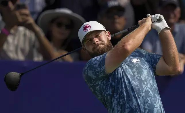 Tyrell Hatton of England hits off the first tee during the first round of World Tour Golf Championship in Dubai, United Arab Emirates, Thursday, Nov. 14, 2024. (AP Photo/Altaf Qadri)