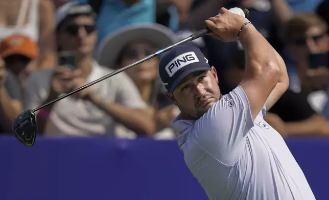 Thriston Lawrence of South Africa hits off the first tee during the first round of World Tour Golf Championship in Dubai, United Arab Emirates, Thursday, Nov. 14, 2024. (AP Photo/Altaf Qadri)