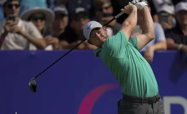 Rory McIlroy of Northern Ireland hits off the first tee during the first round of World Tour Golf Championship in Dubai, United Arab Emirates, Thursday, Nov. 14, 2024. (AP Photo/Altaf Qadri)