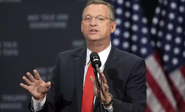 FILE - Former Rep. Doug Collins speaks before Republican presidential nominee former President Donald Trump at a campaign event at the Cobb Energy Performing Arts Centre, Oct. 15, 2024, in Atlanta. (AP Photo/John Bazemore, File)