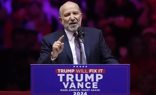 FILE - Howard Lutnick speaks at a campaign rally at Madison Square Garden, in New York, Oct. 27, 2024. (AP Photo/Evan Vucci, File)