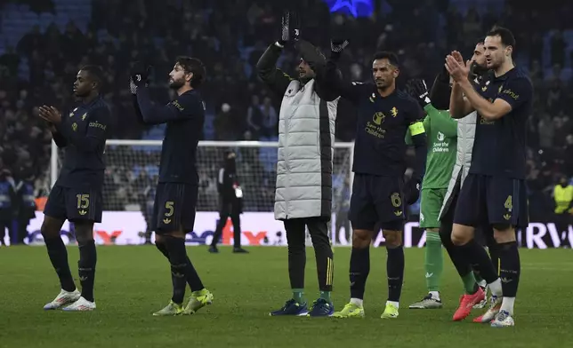 Juventus players leave the pitch after the Champions League opening phase soccer match between Astin Villa and Juventus at Villa Park in Birmingham, England, Wednesday, Nov. 27, 2024.(AP Photo/Rui Vieira)