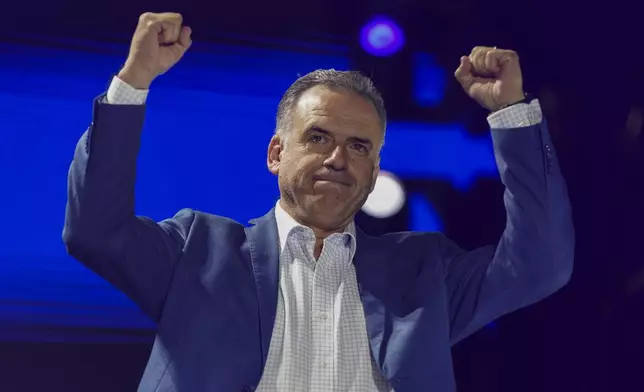 Frente Amplio presidential candidate Yamandu Orsi holds his closing rally ahead of the presidential run-off election in Las Piedras, Uruguay, Wednesday, Nov. 20, 2024. (AP Photo/Matilde Campodonico)