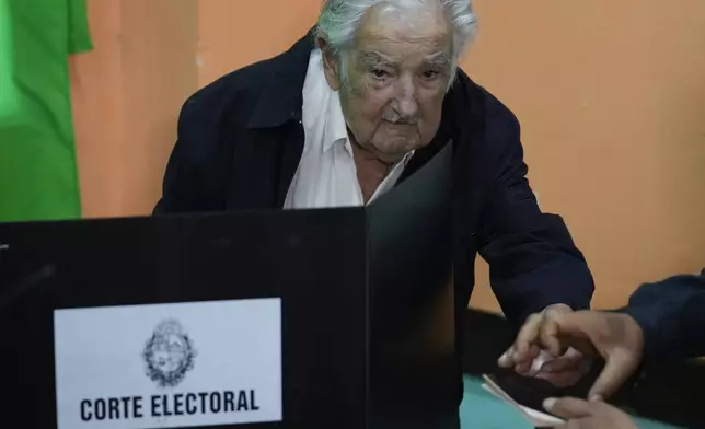Uruguay's former President Jose "Pepe" Mujica votes in the presidential run-off election in Montevideo, Uruguay, Sunday, Nov. 24, 2024.(AP Photo/Natacha Pisarenko)