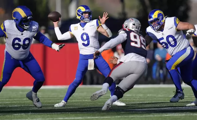 Los Angeles Rams quarterback Matthew Stafford (9) throws a pass against the New England Patriots during the first half of an NFL football game, Sunday, Nov. 17, 2024, in Foxborough, Mass. (AP Photo/Steven Senne)