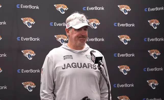 Jacksonville Jaguars head coach Doug Pederson talks to the media after an NFL football game against the Detroit Lions, Sunday, Nov. 17, 2024, in Detroit. (AP Photo/Carlos Osorio)