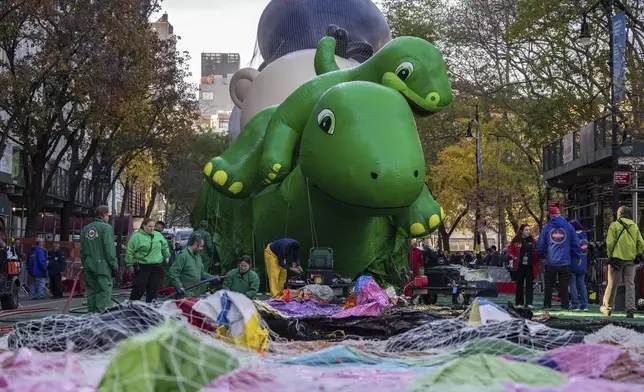 A float of Sinclair's Dina is seen in preparation for the Macy's Thanksgiving Day Parade, Wednesday, Nov. 27, 2024, in New York. (AP Photo/Yuki Iwamura)