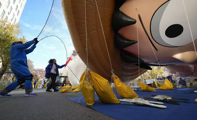 A float featuring a character from the show "One Piece" is inflated in preparation for the Macy's Thanksgiving Day Parade in New York, Wednesday, Nov. 27, 2024. (AP Photo/Seth Wenig)