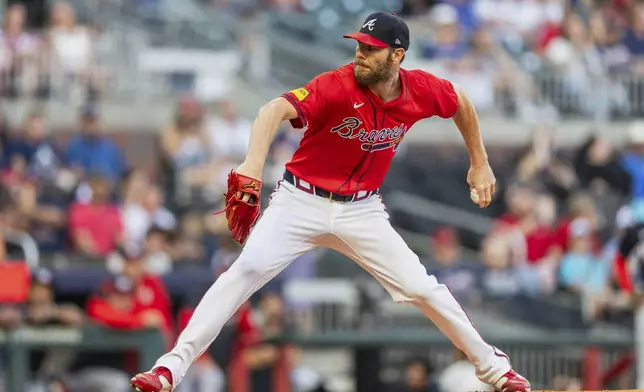 FILE - Atlanta Braves pitcher Chris Sale throws in the first inning of a baseball game, Aug. 23, 2024, in Atlanta. (AP Photo/Jason Allen, File)