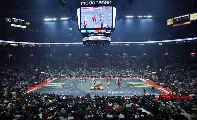 The Minnesota Timberwolves brings the ball up court against the Portland Trail Blazers during the first half of an Emirates NBA Cup basketball game in Portland, Ore., Tuesday, Nov. 12, 2024. (AP Photo/Craig Mitchelldyer)